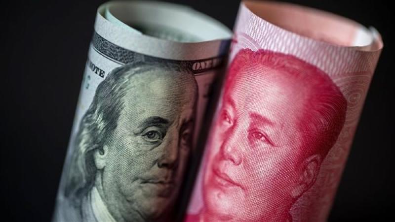 لماذا تحث السلطات الصينية الشركات على تقليص شراء العملات الأجنبية؟
